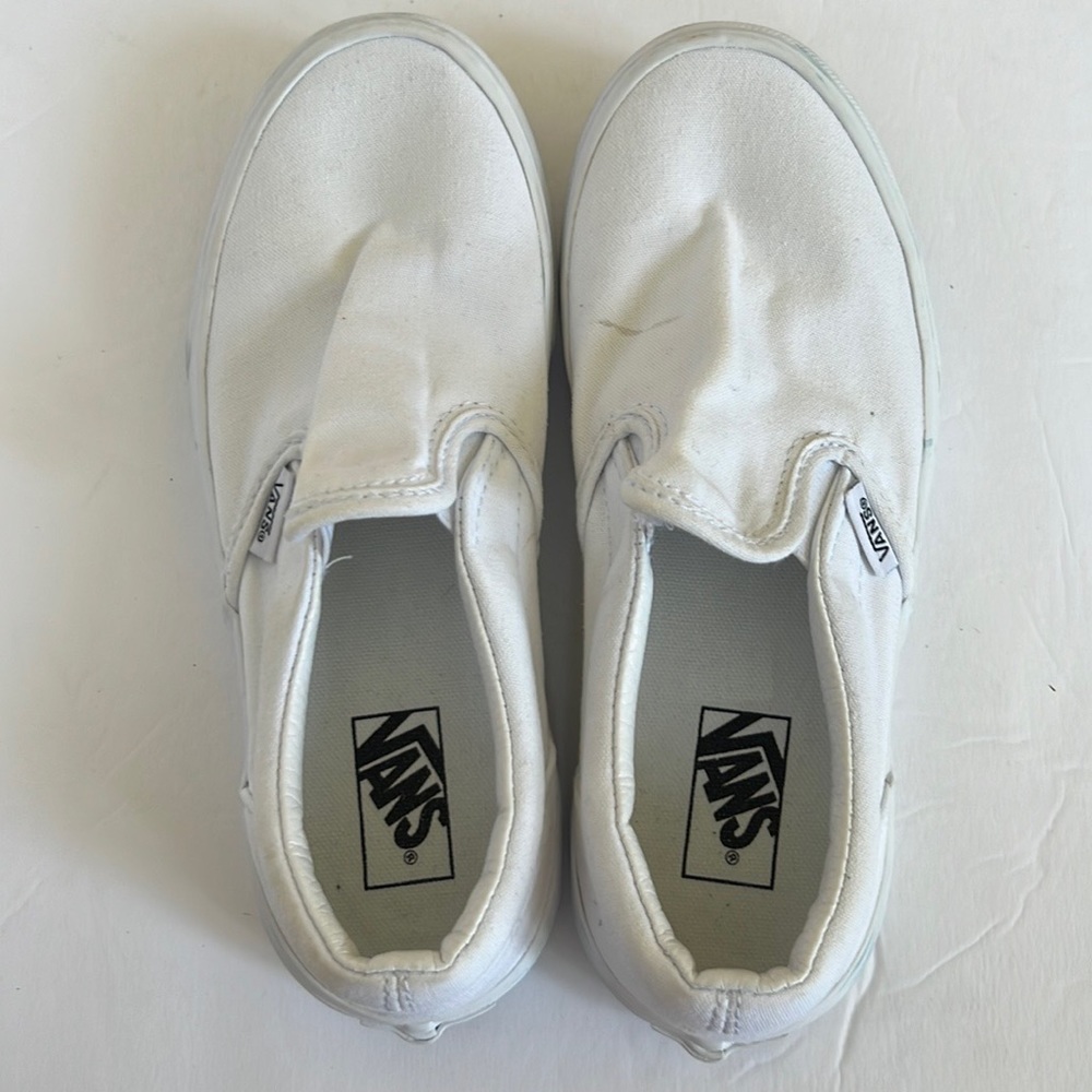 White Slip on Vans Sneakers